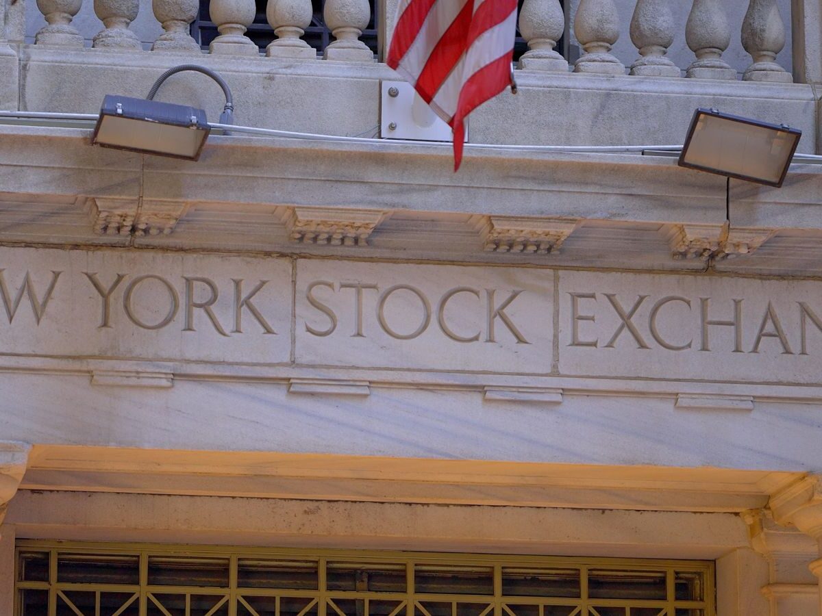 Stocks Settle Lower as Crude Oil Prices Jump